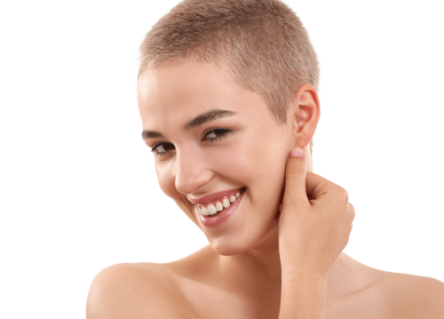 Woman with a shaved head and great skin
