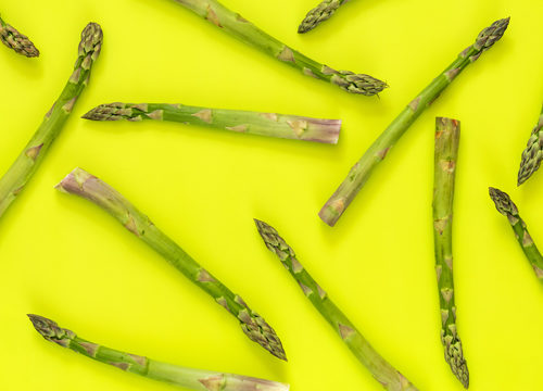 Asparagus on a green background