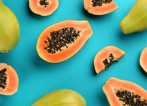 Papayas on a turquoise background